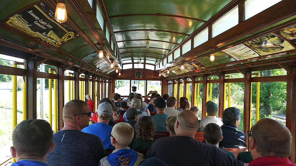 Scouts and parents enjoy a trolley ride.