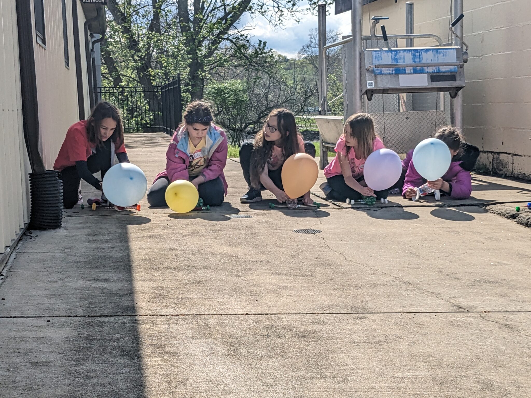 Girl Scouts participate in a STEAM activity.