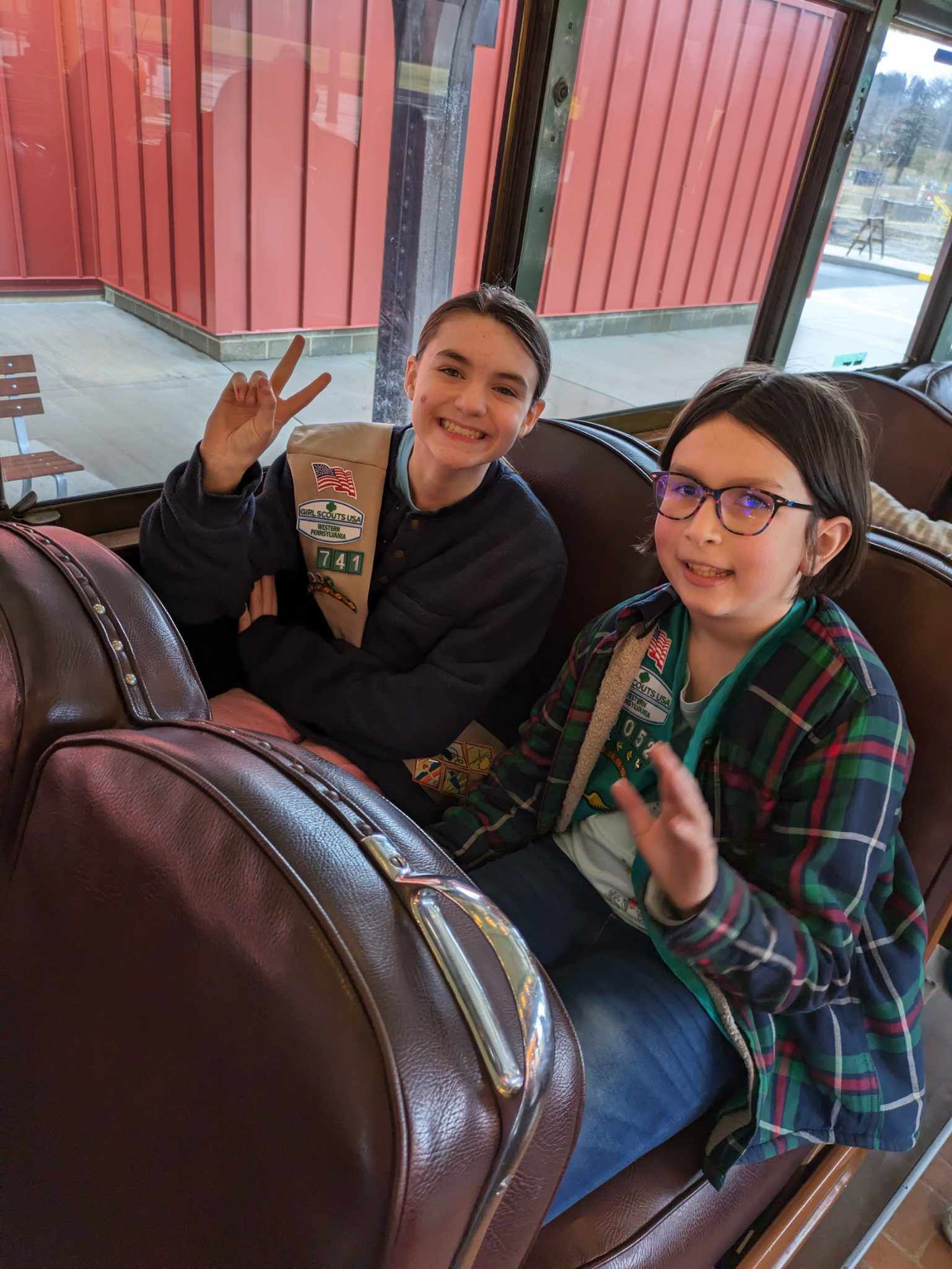 Girl Scouts on a streetcar