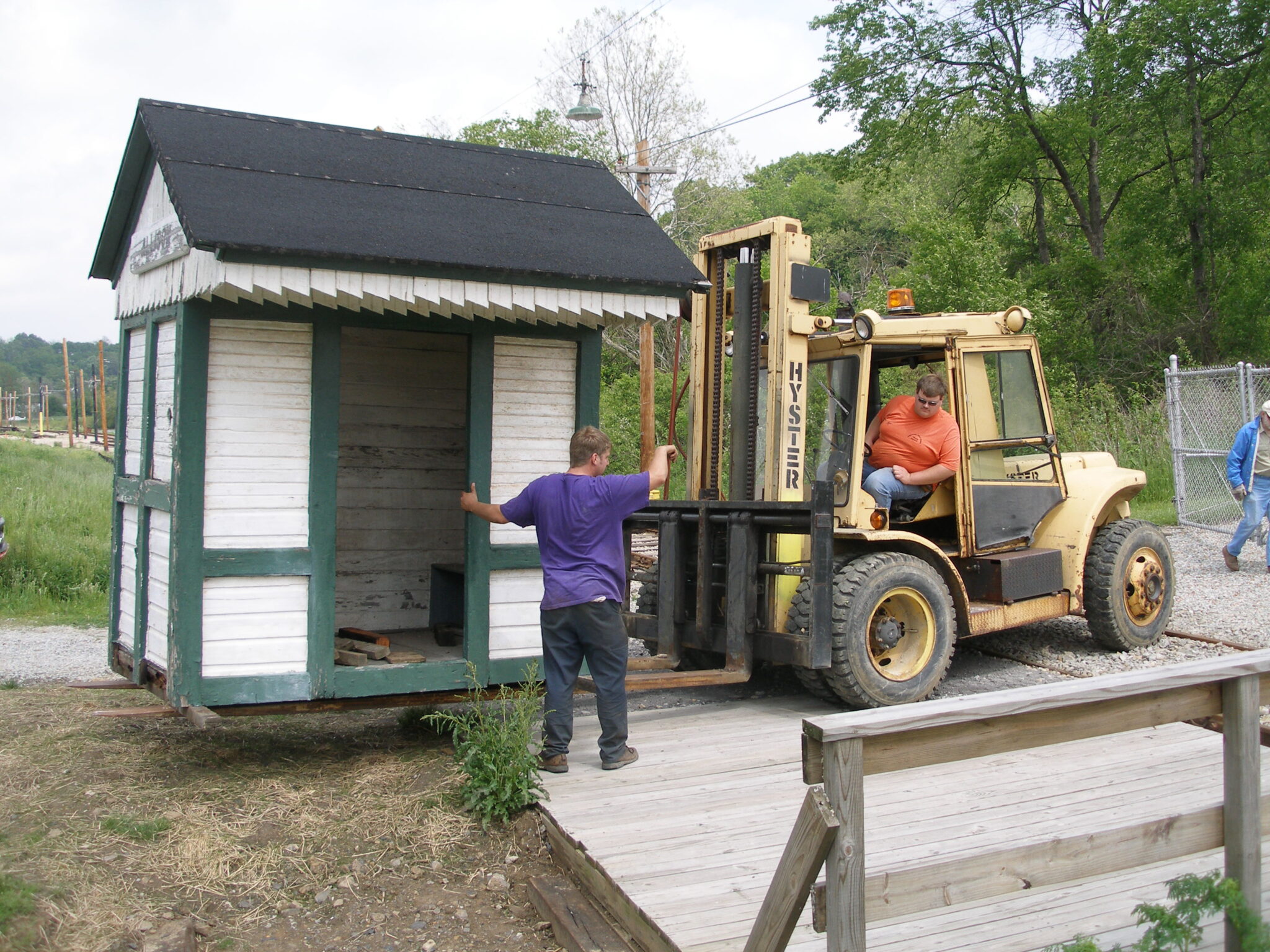 Allison shelter on forklift being lowered