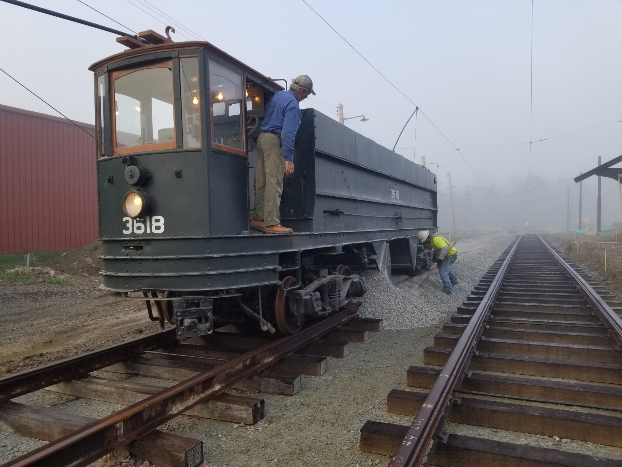 2021-10-27 Larry Lovejoy Oversees Ballasting On Trolley Street using 3618 center dump car