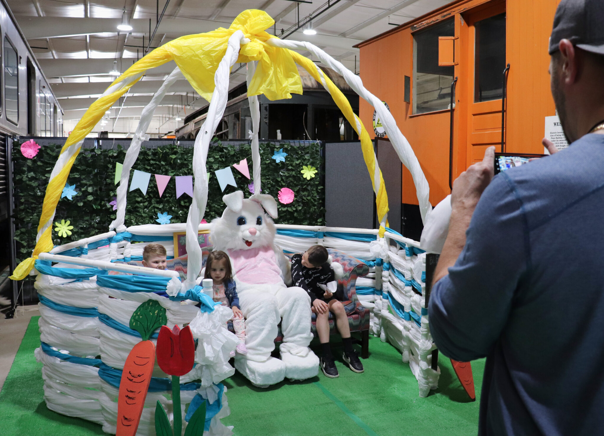Visitors Take Photos With The Easter Bunny