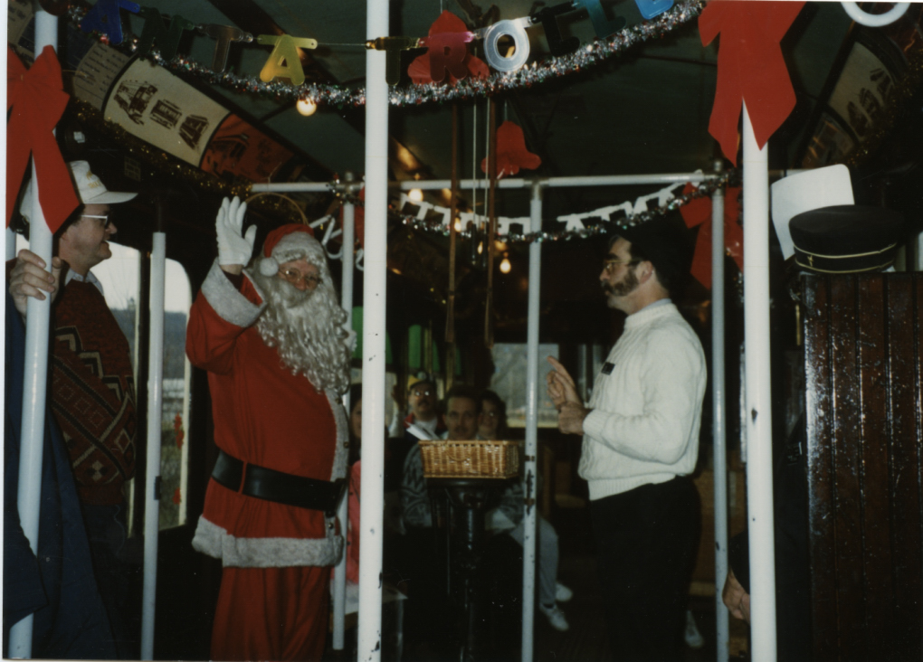 Santa waves inside car 66 from 1995