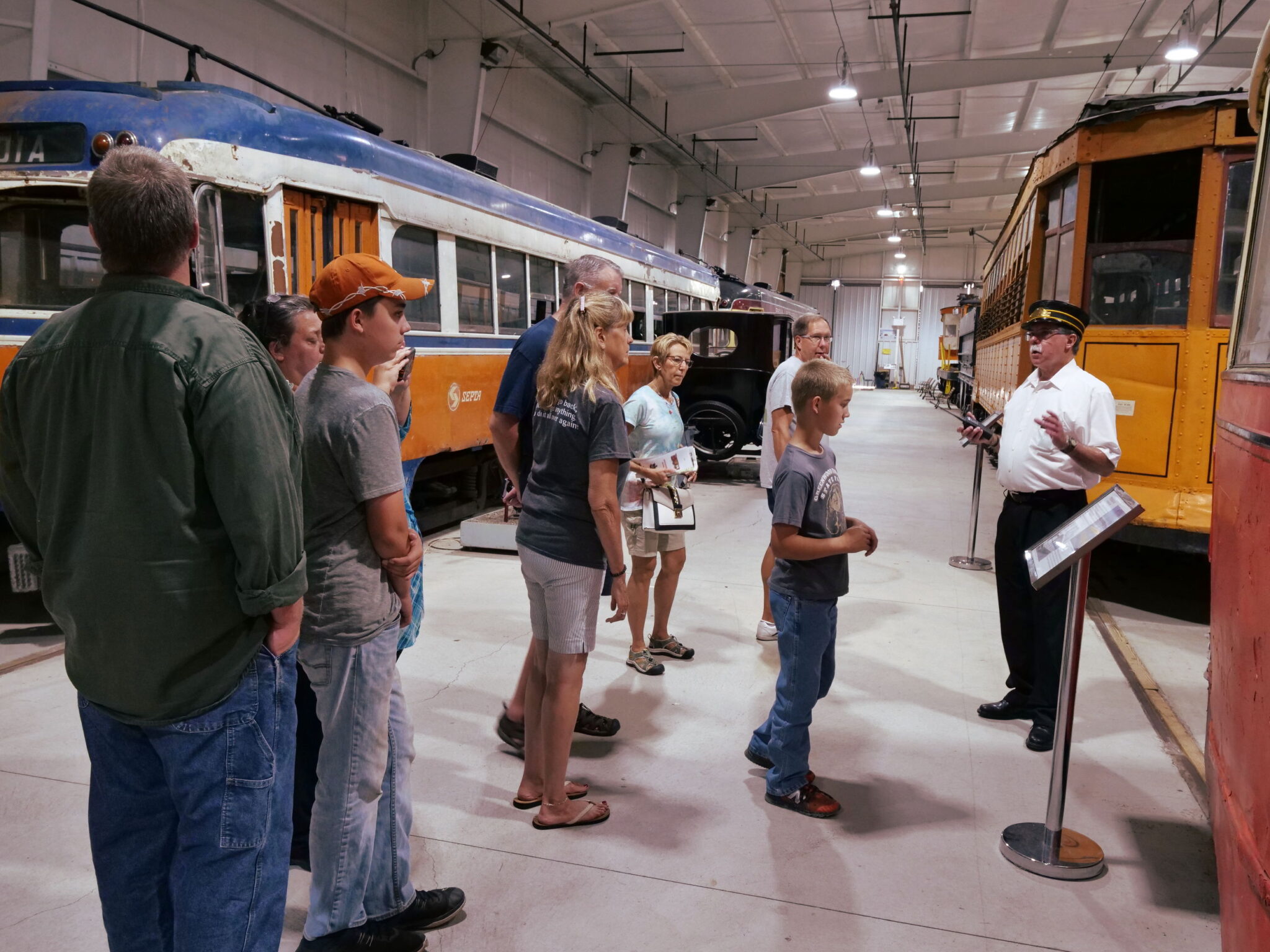 Barrie Baker Gives TDB Tour During Fair. Brian Hudson Photo